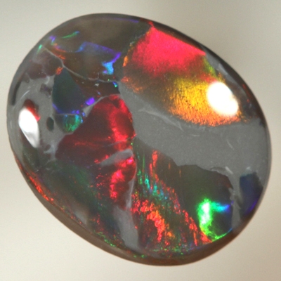 SOLID BLACK OPAL Unusual play of colour, bright fire